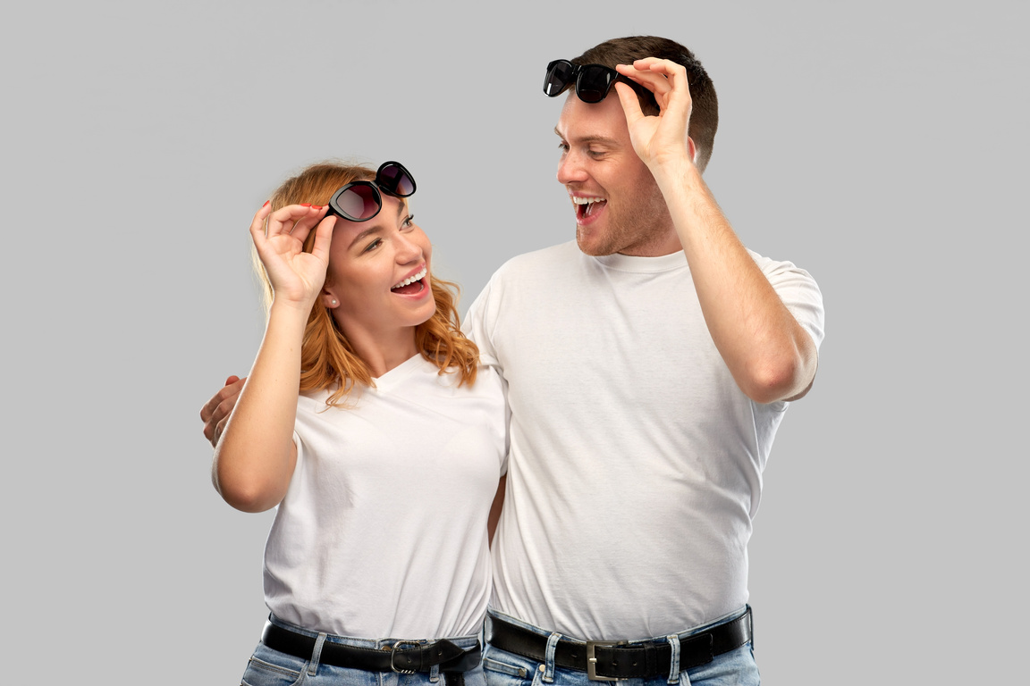 Happy Couple in White T-Shirts and Sunglasses